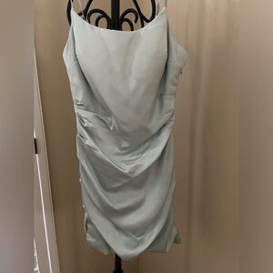 Cocktail dress in sage green.